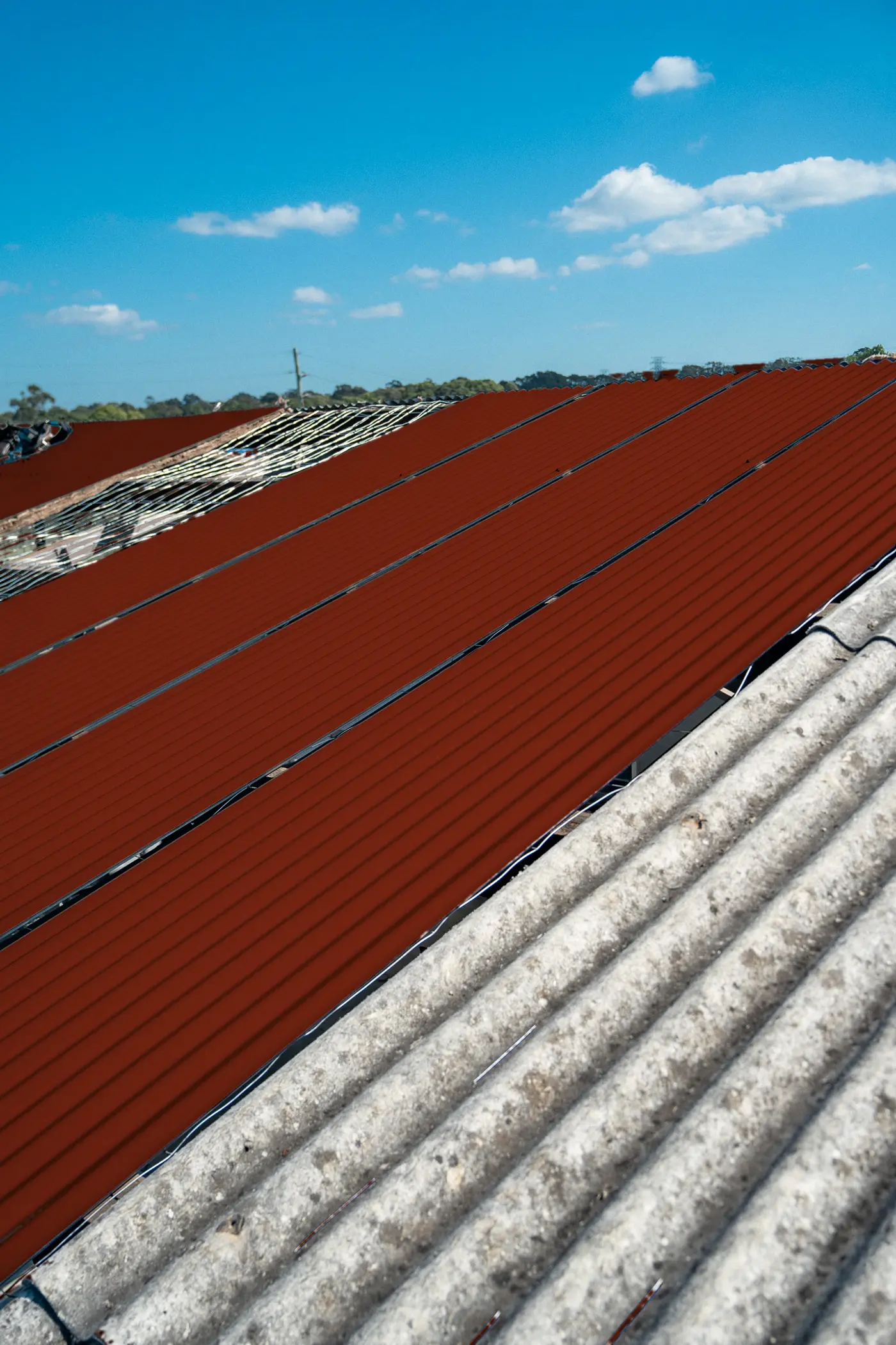 New roof sheets on an AD Roofing job, previewed in Manor Red® COLORBOND®
